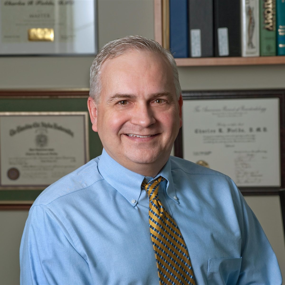 Dr. Charles R. Fields in his office at NOVA Implant & Perio Specialists